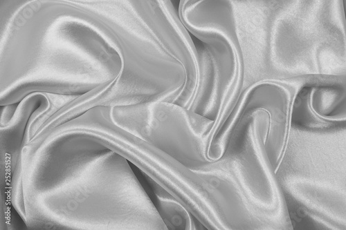 Smooth elegant gray silk or satin texture can use as abstract background