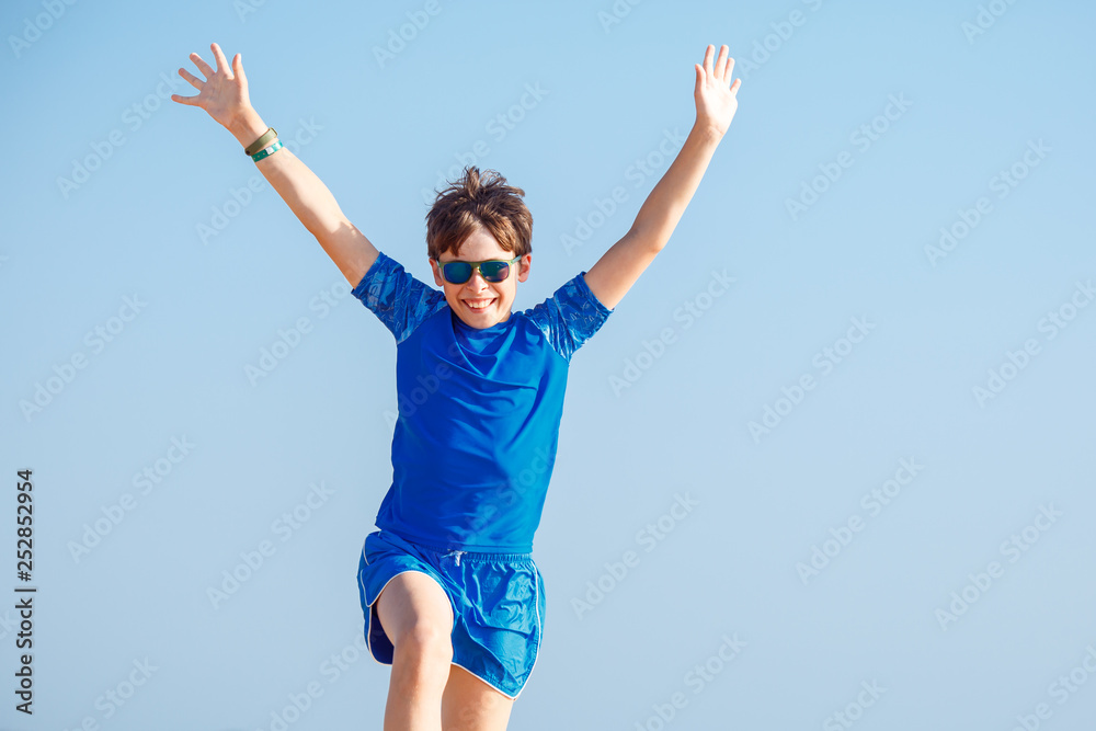 Happy boy with funny expression gesture outdoors Happy boy with funny expression gesture outdoors
