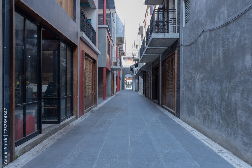 Chinese traditional alley of apartment or restaurant with gray wall Chinese traditional alley of apartment or restaurant with gray wall