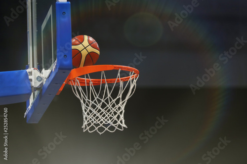 Basketball ball flies into the basketball hoop. Toned © makedonski2015