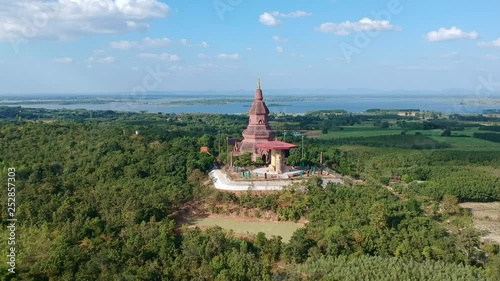 Amazing Thailand PHRA BUDDHA SAIYAT PHUKHAO Wat Putthanimit Pagoda , Wat Phu Khao Temple in Kalasin, Thailand. photo