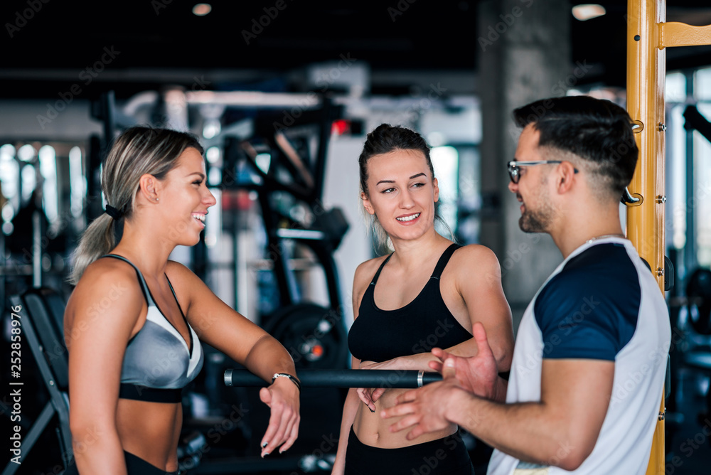 Conversing at the gym. Conversing at the gym.