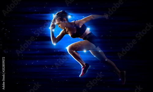 Woman sprinter leaving starting © Andrey Burmakin