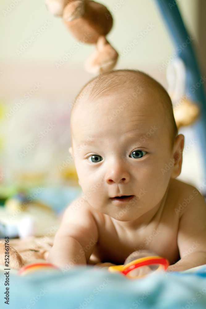Baby Boy or Girl lying Down in the Bed Baby Boy or Girl lying Down in the Bed