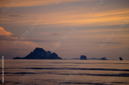 Gloomy tropical sunset Sunset over Water and Islands Thailand