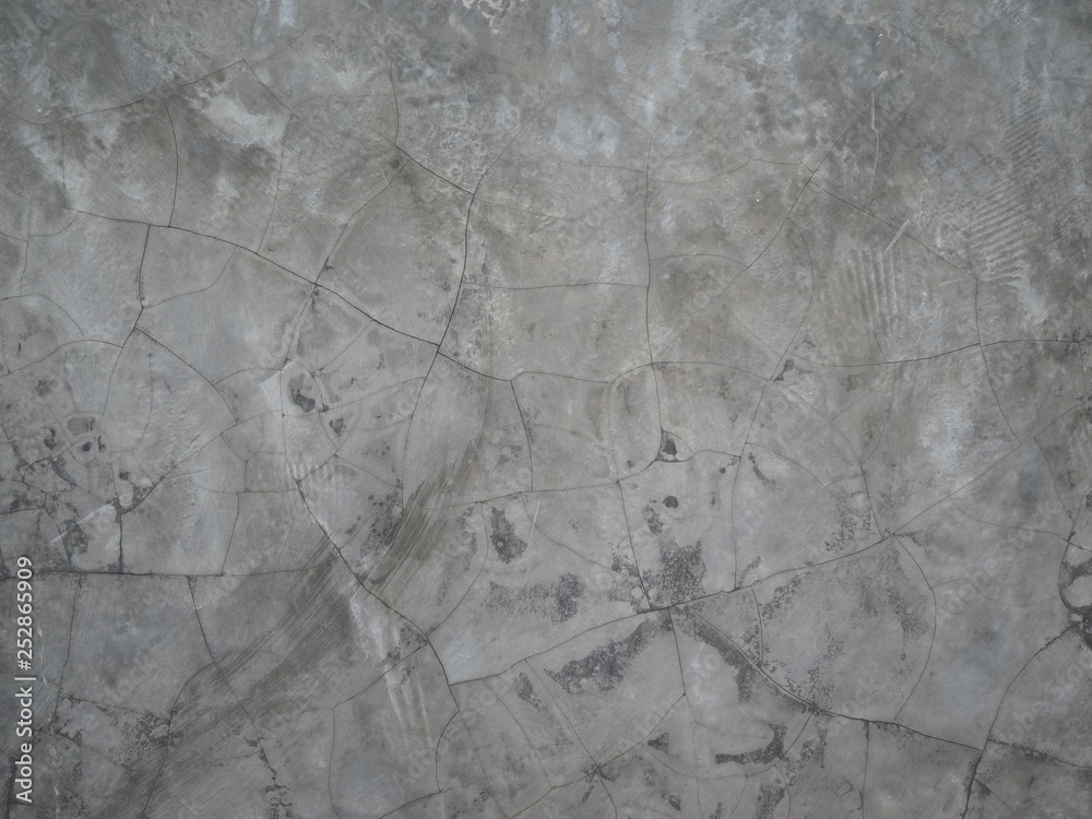 Naklejka premium Gray cement wall with beautiful patterns.