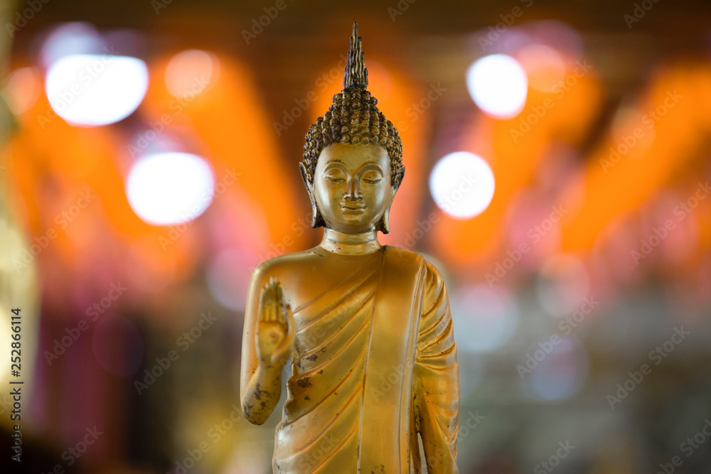 Buddha Statue on bokeh background