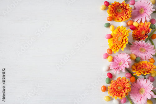 Background festive with flowers gerberas and candy © tachinskamarina