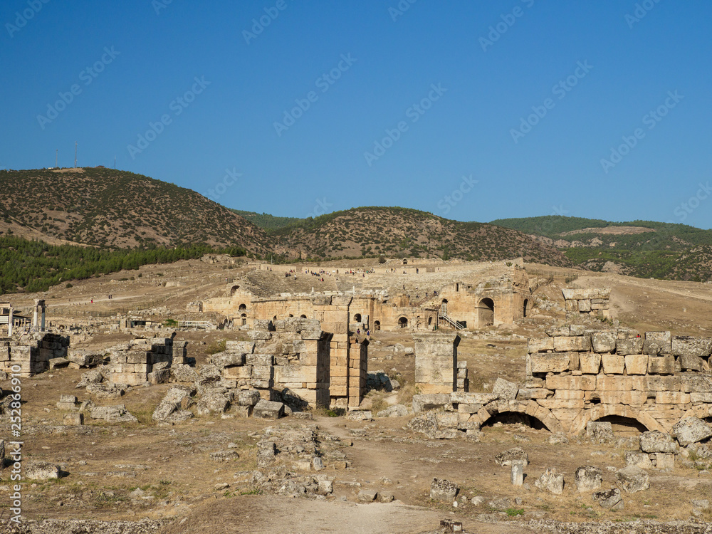 Fototapeta premium Ruins of the theater ancient Roman city of Hierapolis, Pamukkale, Denizli Province, Turkey.