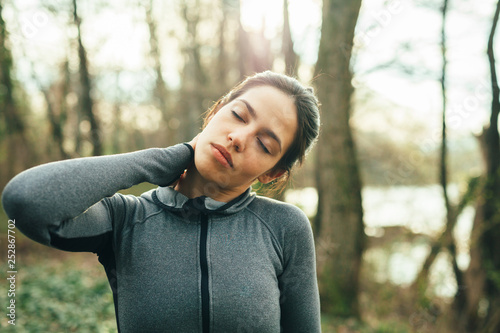Young beautiful woman exercise in the forest