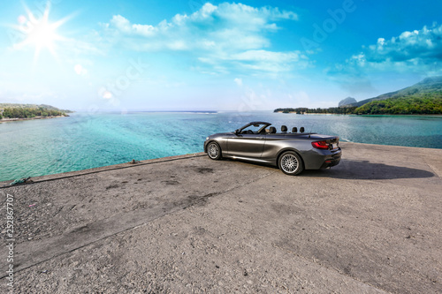 Summer car and sea landscape. Free space for your decoration. 