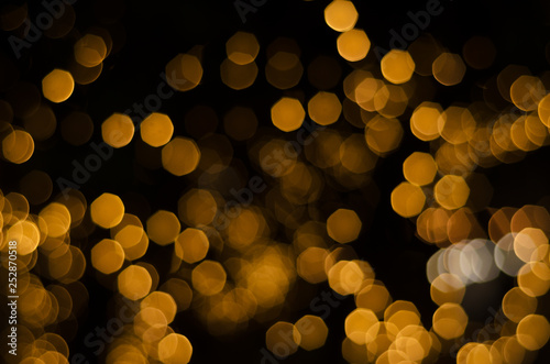 yellow bokeh abstract blurred light wallpaper backgrund.