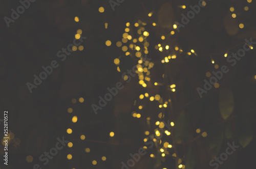yellow bokeh abstract blurred light wallpaper backgrund.
