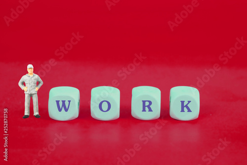 Wallpaper Mural Miniature worker with work word on dice ,business and job concept. Torontodigital.ca