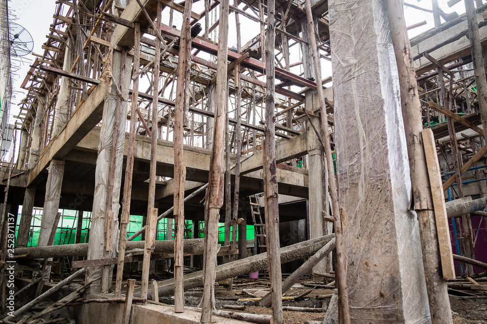 Scaffolding and Cement Building is being built