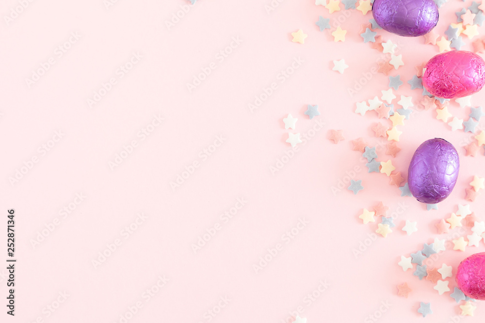 Easter composition. Easter eggs, cookies, sweets, decorationson pastel pink background. Easter holiday concept. Flat lay, top view, copy space Easter composition. Easter eggs, cookies, sweets, decorationson pastel pink background. Easter holiday concept. Flat lay, top view, copy space