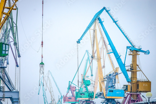indastrial crane in cargo port at winter