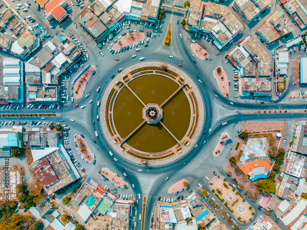 Road and Roundabout top view, Road traffic an important infrastructure in Thailand. Vintage color tone