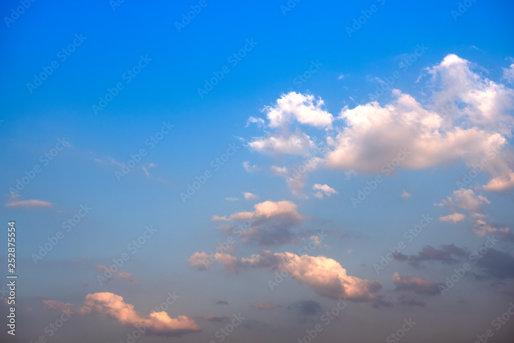 Dramatic blue sky with fluffy clouds texture background. Dramatic blue sky with fluffy clouds texture background.