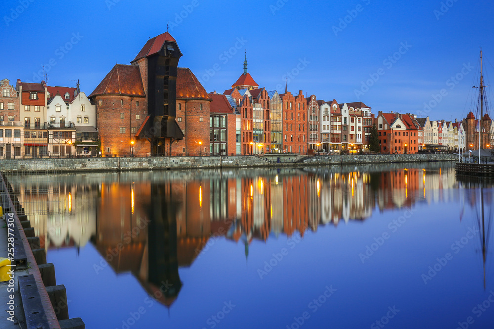 Beautiful old town of Gdansk with historic Crane at Motlawa river, Poland Beautiful old town of Gdansk with historic Crane at Motlawa river, Poland
