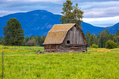 Old log barn with gambrel roof, Montana