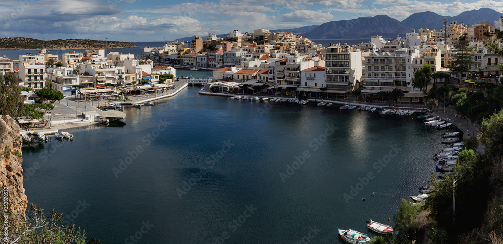 View of the embankment of the city Saint Nicholas and a sea lake from high (island Crete, Greece)