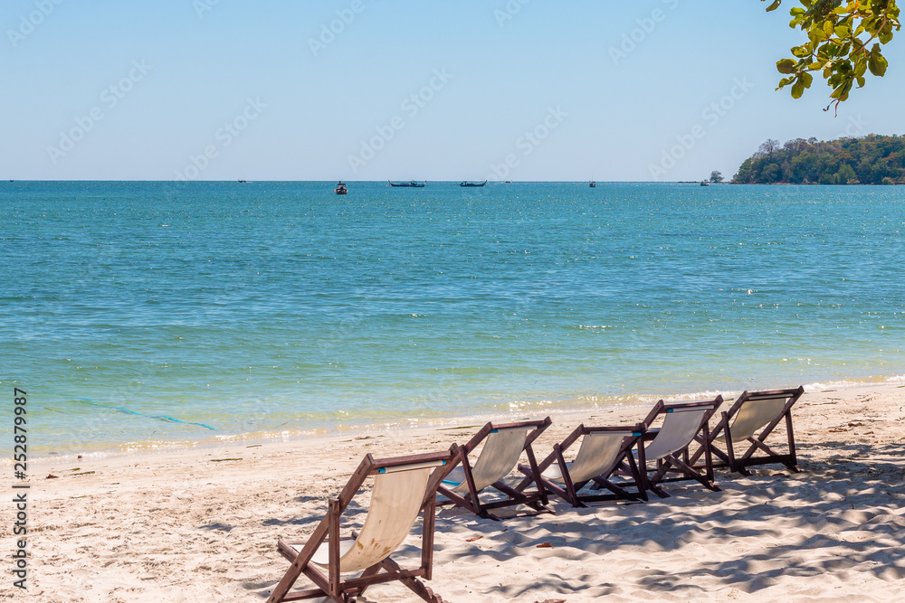 Deck chairs on Sivalai beach,Koh Mook island,Thailand. February 2019.