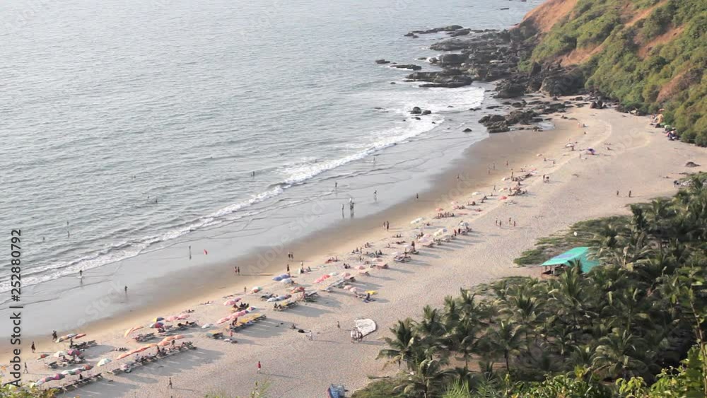 sandy beach with beach beds and umbrellas on the background of the ocean aerial view sandy beach with beach beds and umbrellas on the background of the ocean aerial view