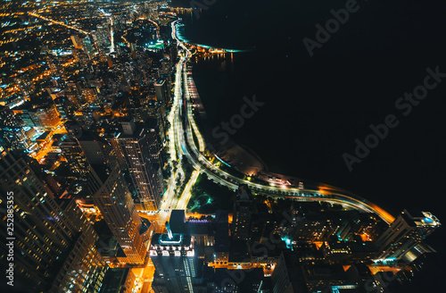 Chicago streets along Lake Michigan from above at night