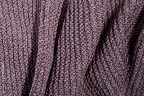 Knitted brown scarf texture.