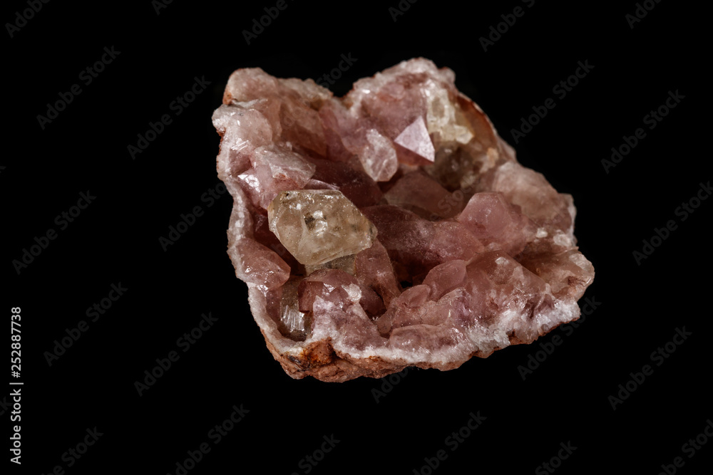 Macro mineral stone Pink Amethyst on a black background