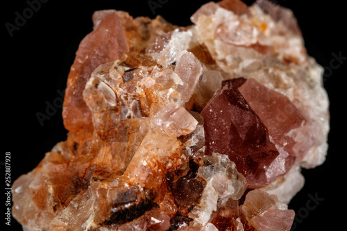 Macro mineral stone Pink Amethyst on a black background