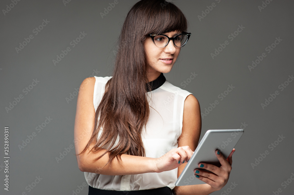 Beautiful female high school student studying with books