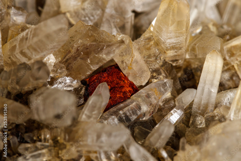 Macro mineral quartz stone with Limonite and Lepidolite black background Macro mineral quartz stone with Limonite and Lepidolite black background