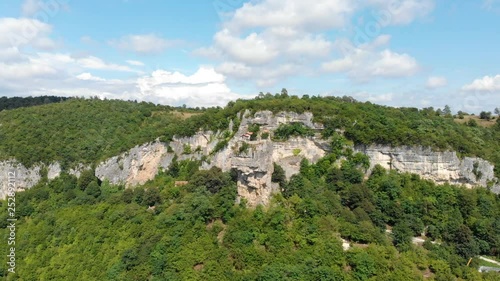 Aerial panoramic view of touristic landmark Katskhi Pillar with ancient Orthodox church on top in Chiatura, Georgia