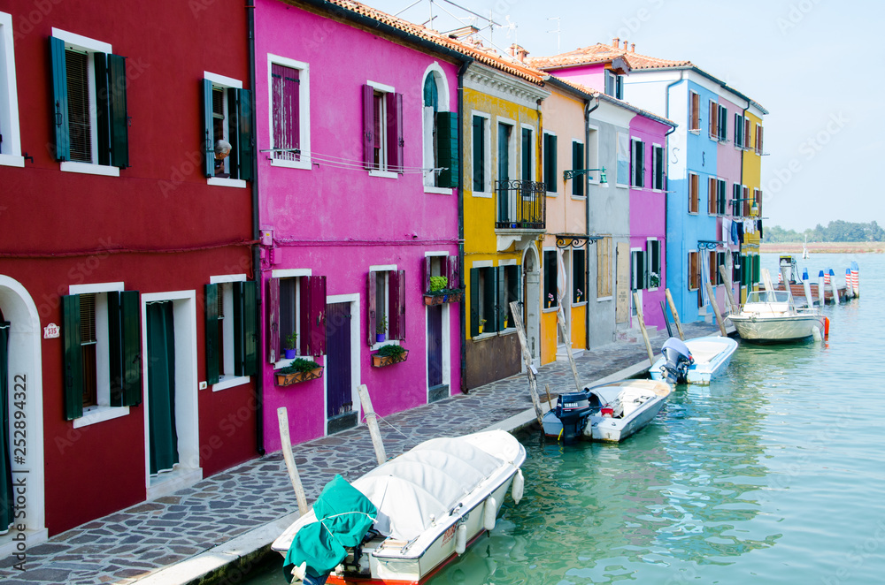 The waterfront of Burano, Italy. Fairytale colorfull houses. 