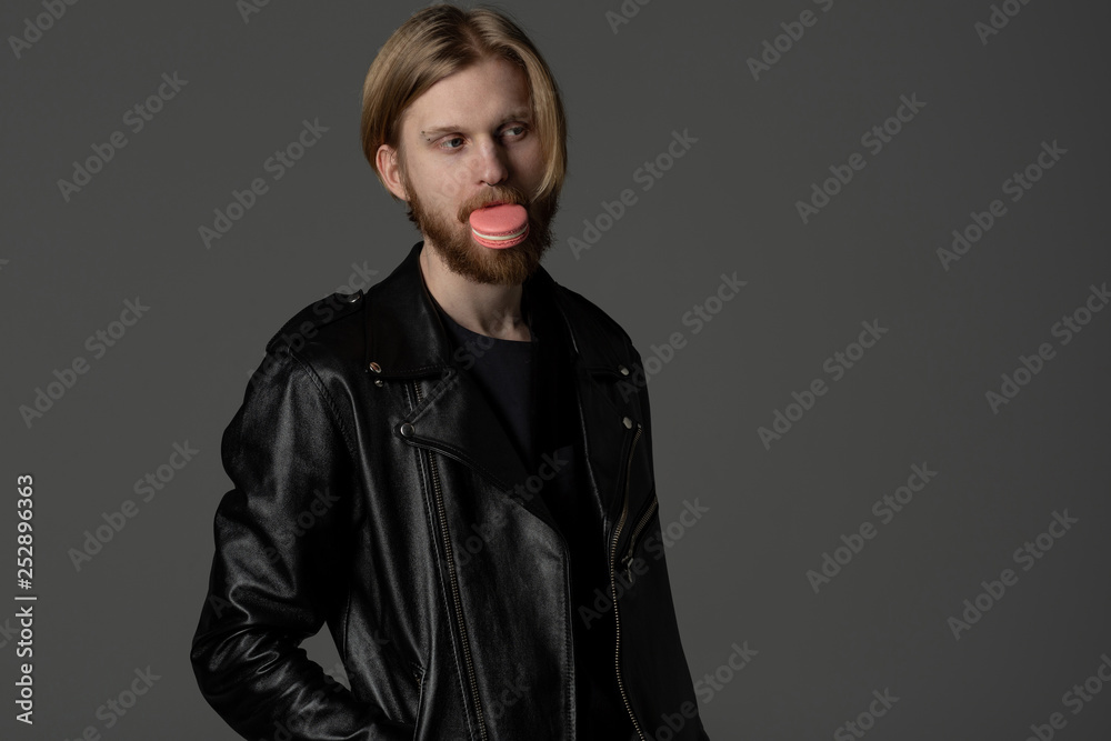 Close up portrait of beautiful guy with light hair and beard Close up portrait of beautiful guy with light hair and beard