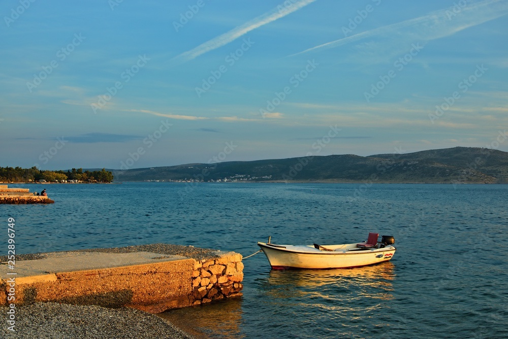 Croatia-view of a the harbor in town Starigrad at sunset Croatia-view of a the harbor in town Starigrad at sunset