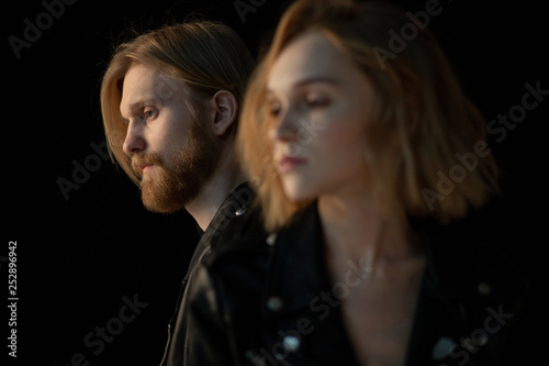 Close up portrait of hipster couple in black leather jackets