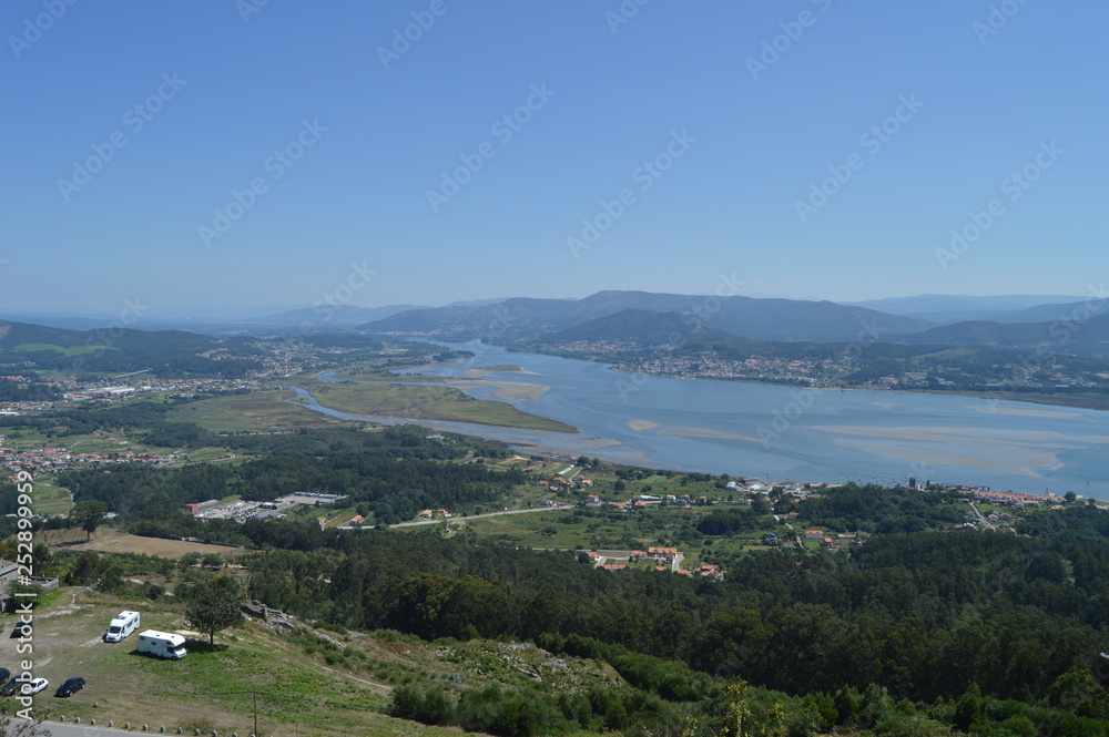 Views Of The Miño River And Portuguese Village Of Caminha From The Castro Of Santa Tecla In The Guard. Architecture, History, Travel. August 15, 2014. La Guardia, Pontevedra, Galicia, Spain.