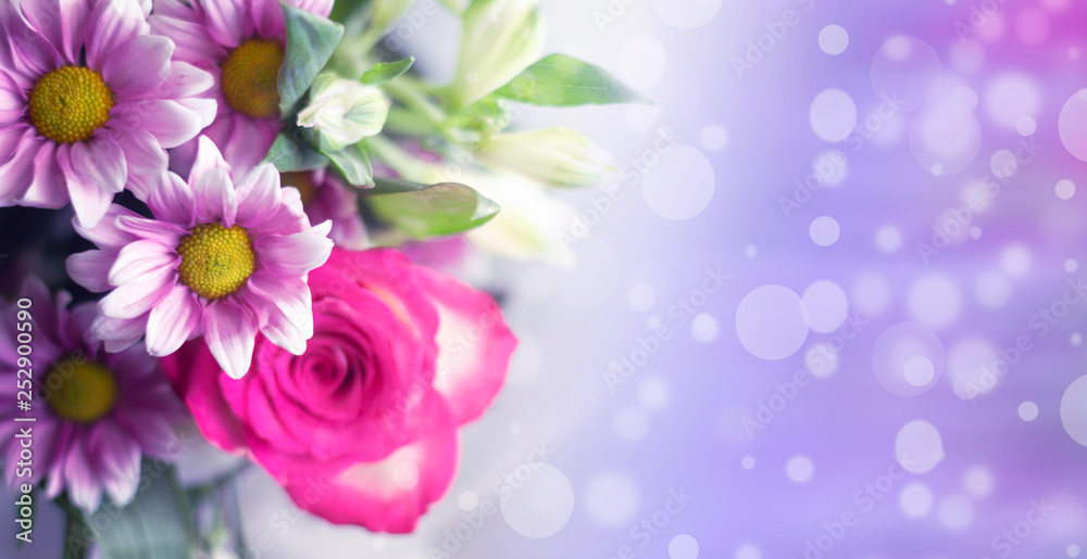 Fototapeta premium Floral festive background template. A bouquet of flowers on a light background bokeh.