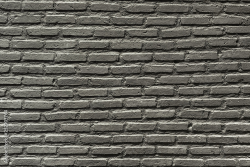 rough dark brick wall surface, abstract background texture