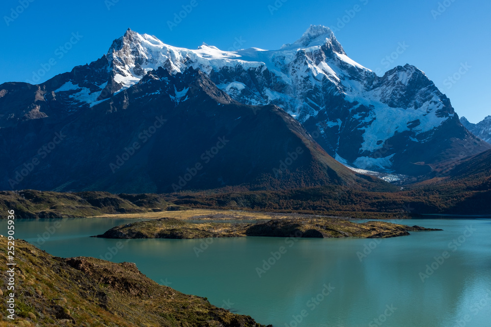 A majestic lake in Patagonia with mountain range in the background, Torres del Paine, National Park, Chile