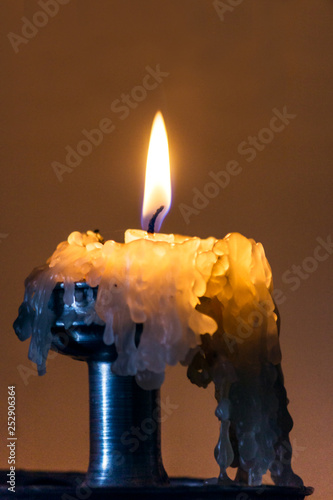 Candle burning down.