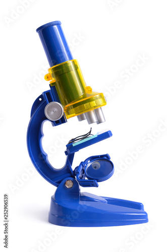 Blue children's microscope isolated on white background