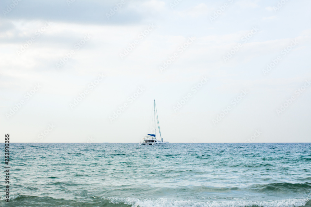 Sailboat in the middle of the sea Phuket Thailand