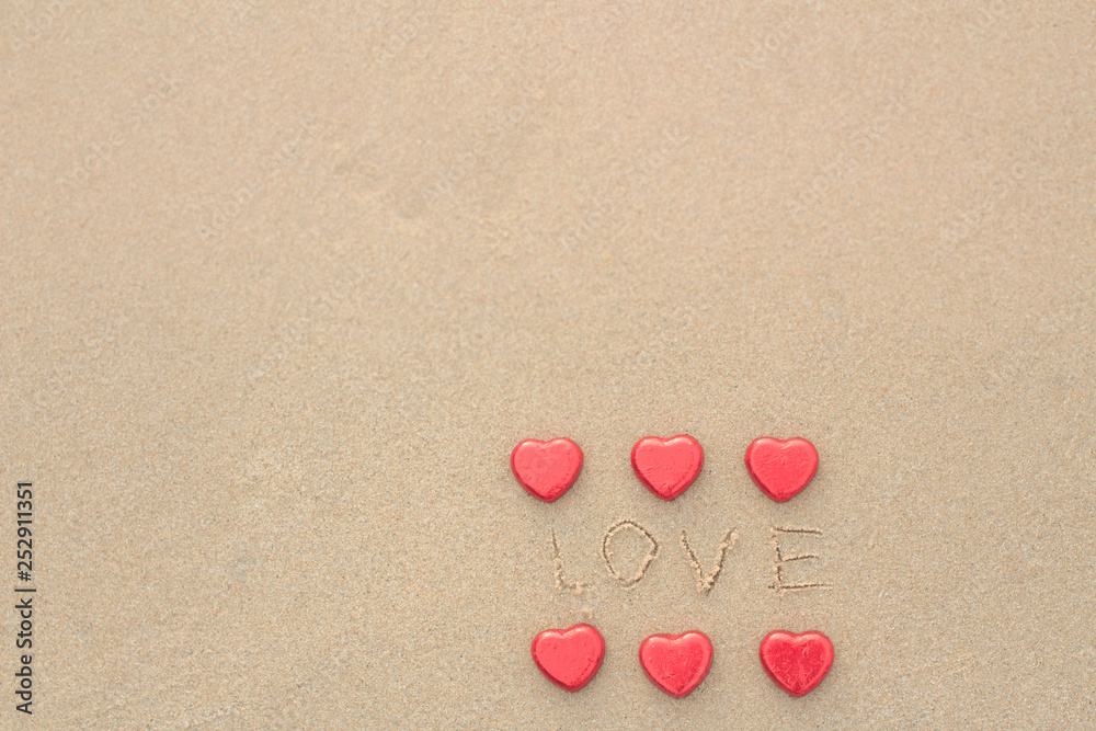 Chocolate color Lovely red heart on the beach. Background is a natural in real place, creative Valentine's Day Concept, tropical style background made in Phuket, Thailand.