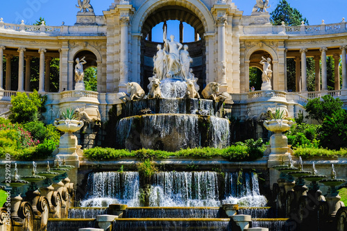 Marseille. Palais de Longchamp with fountains and sculptures in sunny day, central cascade.