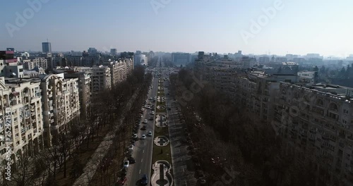 Aerial cityscape with a busy boulevard in Bucharest on a sunny day photo