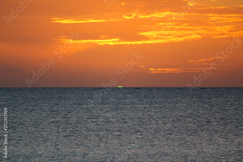 Sunset (Green flash) in the Blue Lagoon Beach in Nacula Island, Yasawa, Fiji
